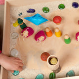 A sensory small world setup inside a Grapat wooden freeplay tray