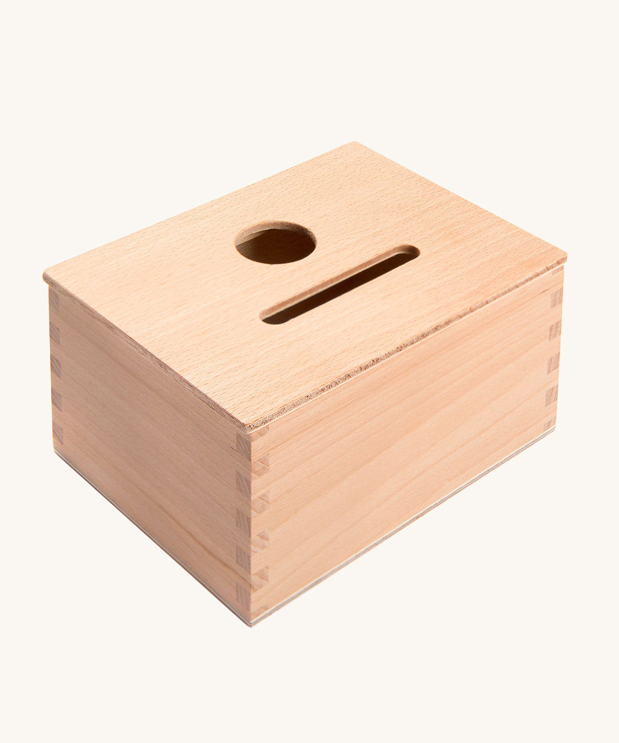 Grapat Permanence Box. A wooden box that has two slots in the top one for coins and one circular that will fit small toys such as Nin peg dolls. This wooden box is part of a wide range of open ended toys available at Babipur. 