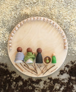 The Grapat wooden toy Construction Platform in use with toys placed on it. Grapat have a wide range of wooden toys and loose parts available at Babipur. 