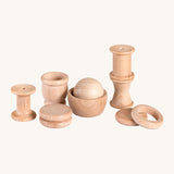 Grapat 10 Element Treasure Basket. 10 wooden loose parts that babies and young children will love to touch and feel. These Grapat pieces are part of a big range of open ended wooden toys available at Babipur. 