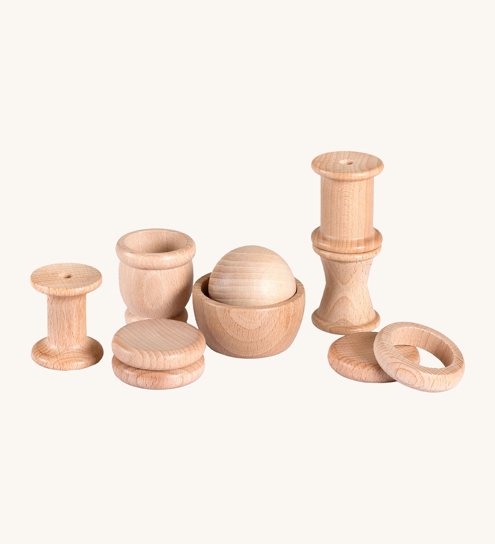 Grapat 10 Element Treasure Basket. 10 wooden loose parts that babies and young children will love to touch and feel. These Grapat pieces are part of a big range of open ended wooden toys available at Babipur. 