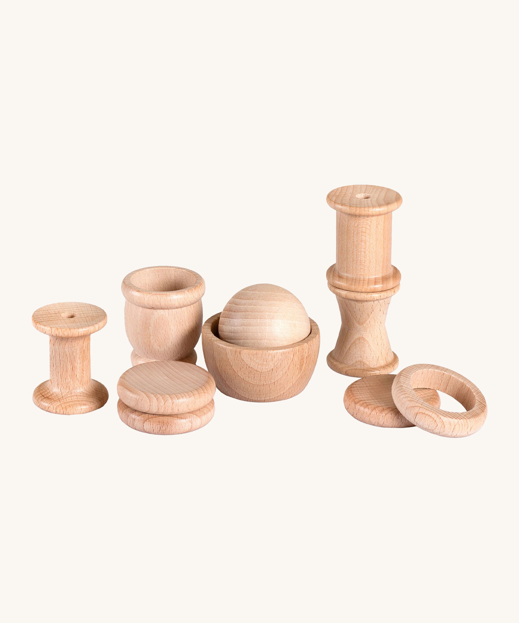 Grapat 10 Element Treasure Basket. 10 wooden loose parts that babies and young children will love to touch and feel. These Grapat pieces are part of a big range of open ended wooden toys available at Babipur. 