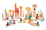 Grapat plastic-free Happy Place toy blocks set laid out on a white background with some Grapat Nins (not included in the set)