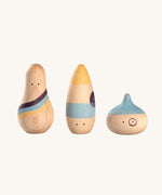 Grapat Wow! Set. A set of three wooden toy figures hand painted in red, purple and yellow.