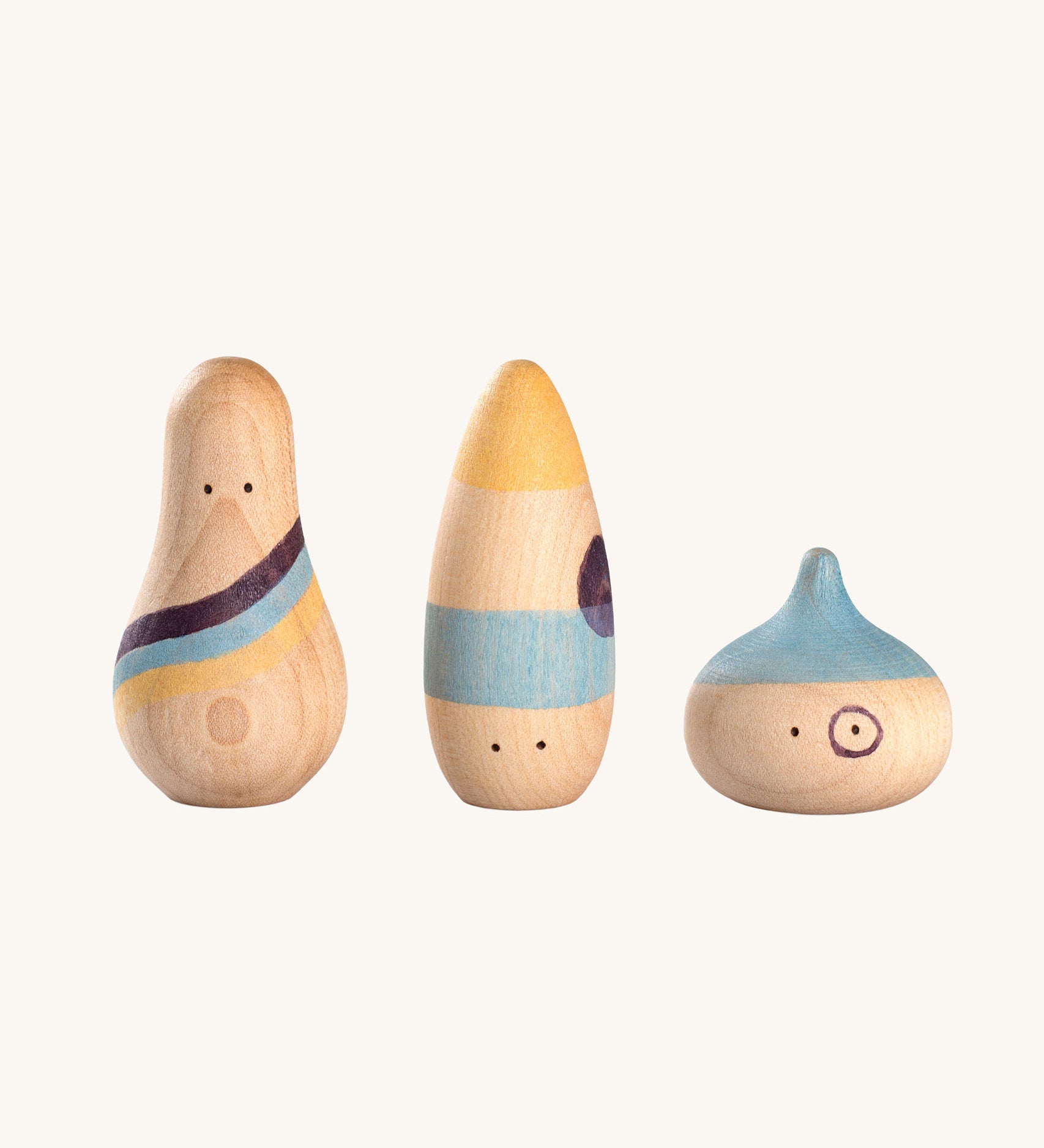 Grapat Wow! Set. A set of three wooden toy figures hand painted in red, purple and yellow.