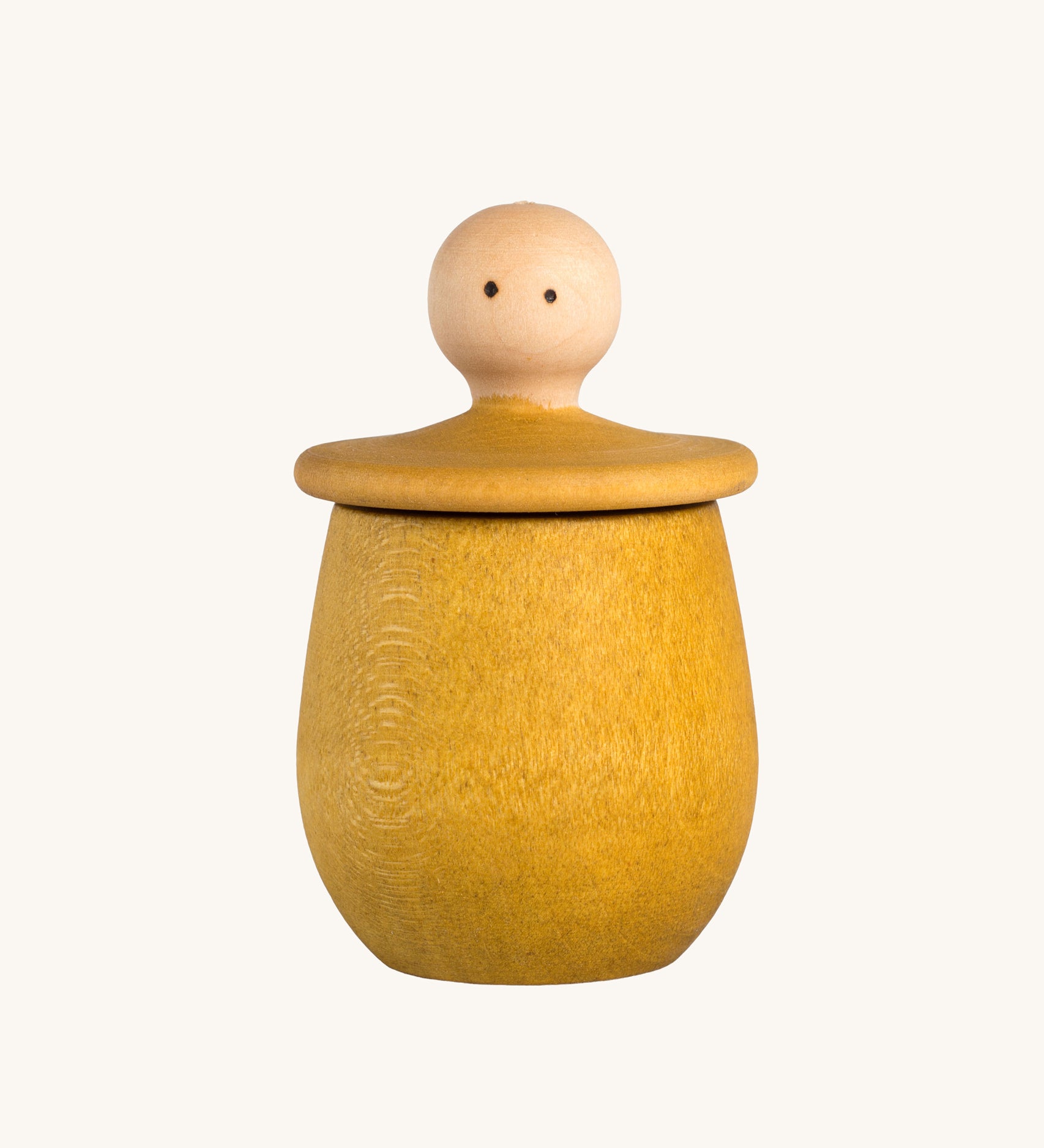 Grapat yellow Little Things. A wooden top with eyes drawn on and a yellow coloured pot to match. Grapat have a wide range of wooden toys and loose parts available at Babipur. 