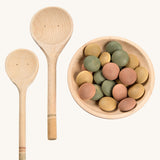 Grapat Yummy Wooden Play Food Set. The set comes with two wooden spoons a bowl and coloured pebbles in pastel shades. 