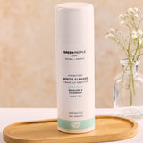Green People Gentle Cleanse & Make-up Remover 150ml placed on an oval shaped bamboo tray. 