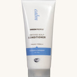 Green People Irritated Scalp Conditioner in a 200ml tube on a plain background. 