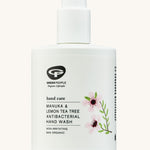 Green People Manuka & Lemon Tea Tree antibacterial Hand Wash on a plain background. 