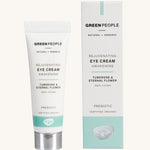 Green People Rejuvenating Eye Cream in a tube next to the cardboard packaging on a plain background. 