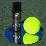 The Green People Sports+ Sun Cream in black sun resistant packaging, next to a tennis ball.
