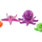 Green rubber toys biodegradable sea creature toys on a white background