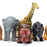 Green Rubber Toys biodegradable natural rubber jungle animals set on a white background