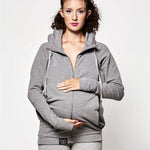 An adult wearing the Love Radius Parents Hoodie In Heather Grey slightly unzipped