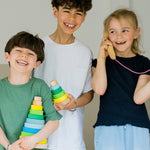 Grimm's Small Conical Stacking Tower - Neon Green - Three children play together