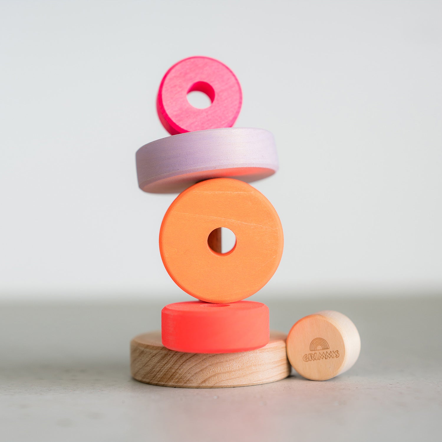 Grimm's Small Conical Wooden Stacking Tower Toy - Neon Pink – Babipur