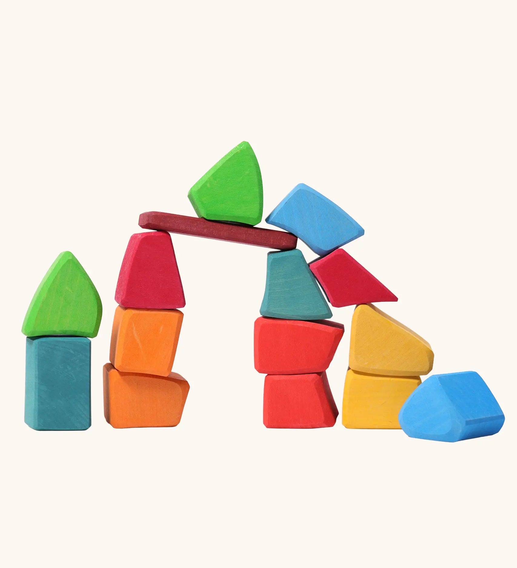 Grimm's 15 rainbow coloured wooden toy building blocks.