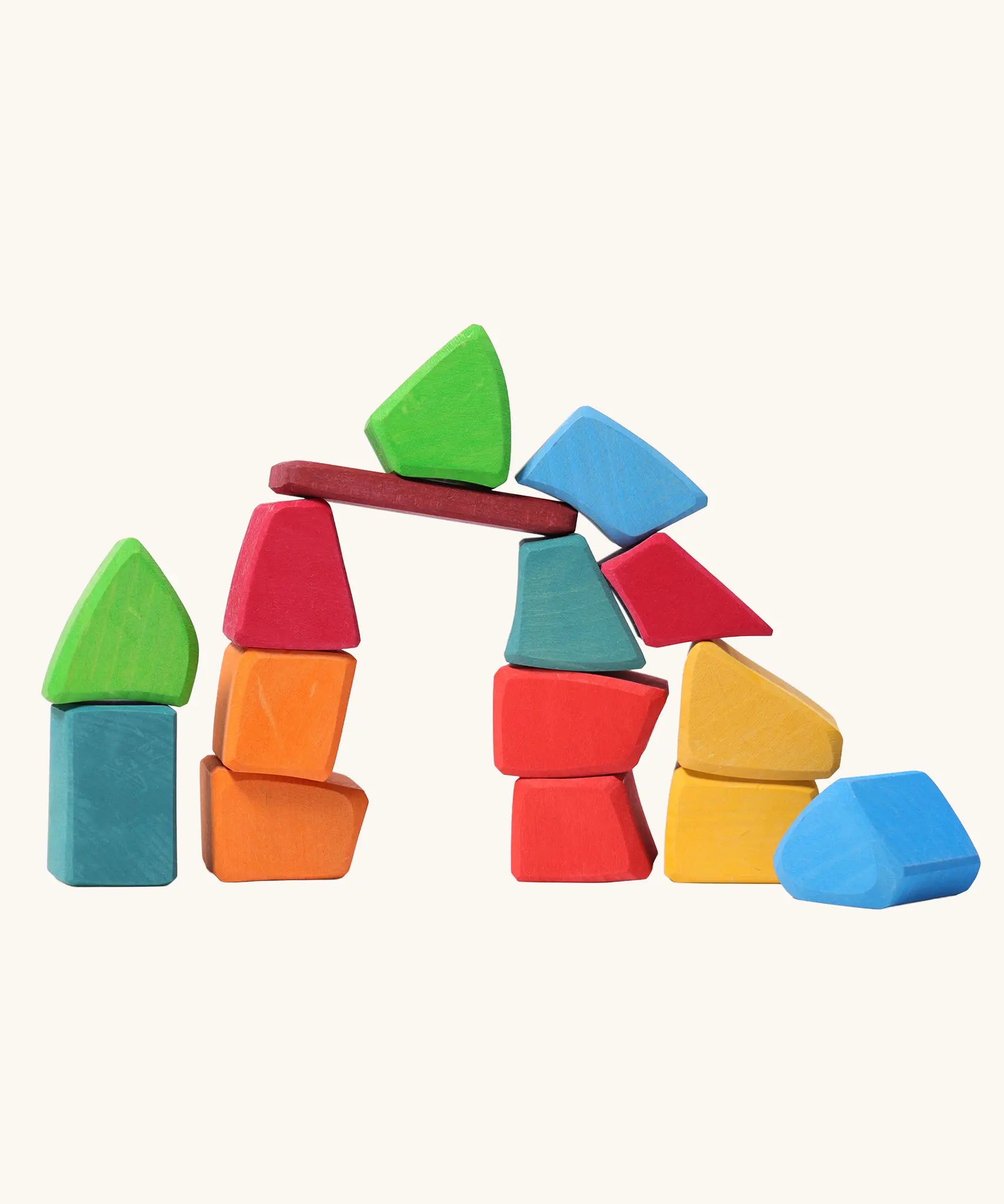 Grimm's 15 rainbow coloured wooden toy building blocks.