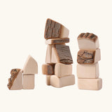 Grimm's 15 wooden blocks with natural bark.