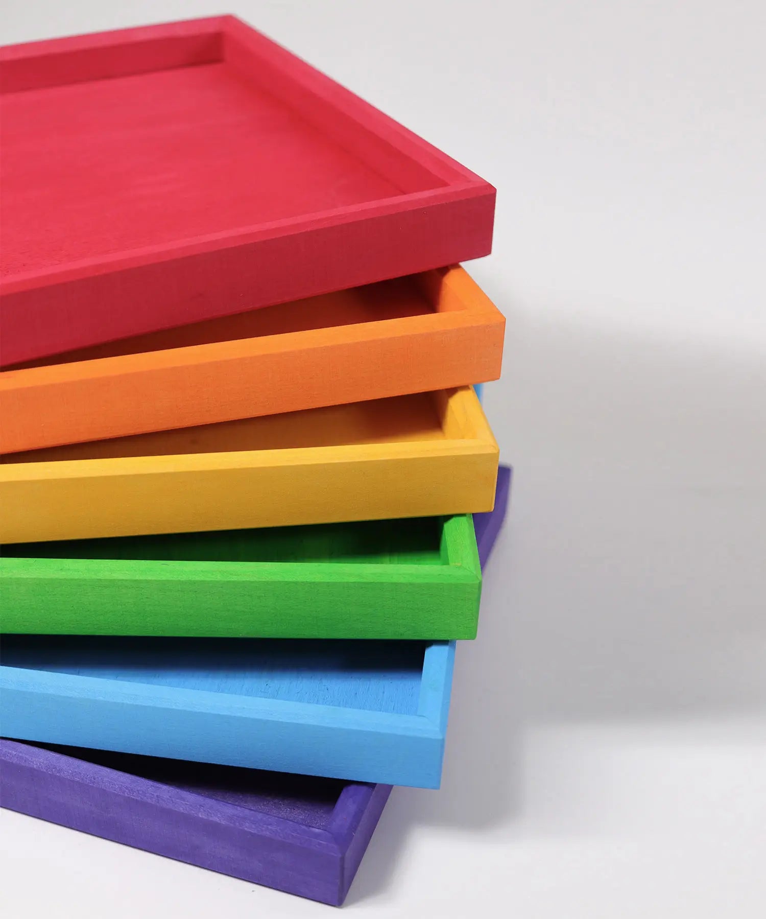 Grimm's handcafted wooden frames in a rainbow palette showing corner detail 