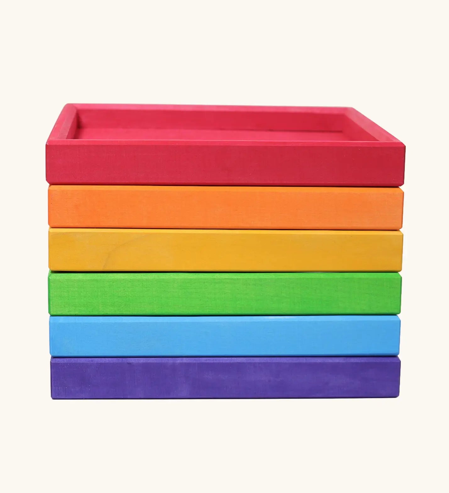 6 handcrafted wooden Grimm's frames in a rainbow palette. Made for storing, stacking and building.