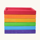 6 handcrafted wooden Grimm's frames in a rainbow palette. Made for storing, stacking and building.