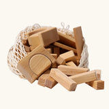 Grimm's 60 natural geo wooden building blocks in a storage bag. 