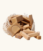 Grimm's 60 natural geo wooden building blocks in a storage bag. 