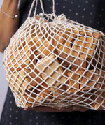 Grimm's 60 natural geo wooden building blocks in a net storage bag