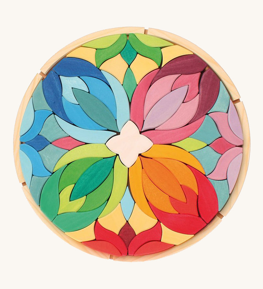 Grimm's Lara Mandala Building Set in a wooden tray.