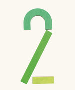 The number 2 made from the Grimm's handcrafted wooden alphabet letter shapes
