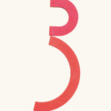 The number 3 made from the Grimm's handcrafted wooden alphabet letter shapes