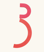 The number 3 made from the Grimm's handcrafted wooden alphabet letter shapes