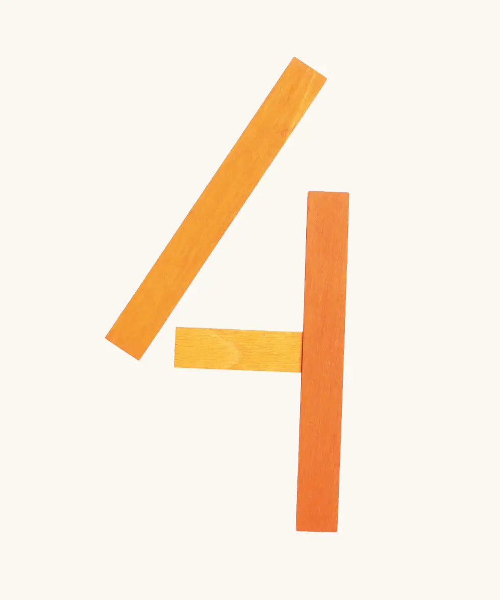 The number 4 made from the Grimm's handcrafted wooden alphabet letter shapes