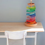 Grimms handcrafted wooden ball run assembly set displayed on a table