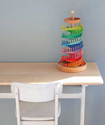 Grimms handcrafted wooden ball run assembly set displayed on a table