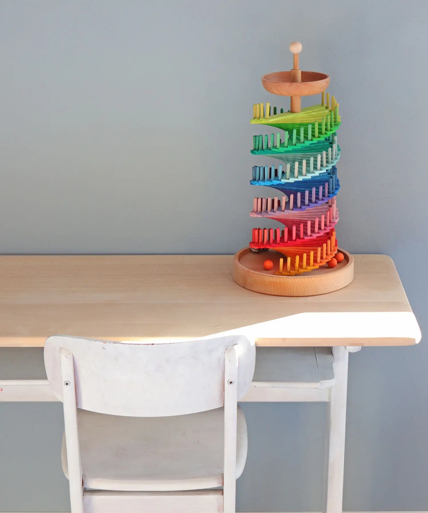 Grimms handcrafted wooden ball run assembly set displayed on a table