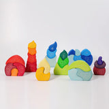 Collection of wooden blocks toy houses from Grimm's. 