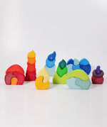 Collection of wooden blocks toy houses from Grimm's. 