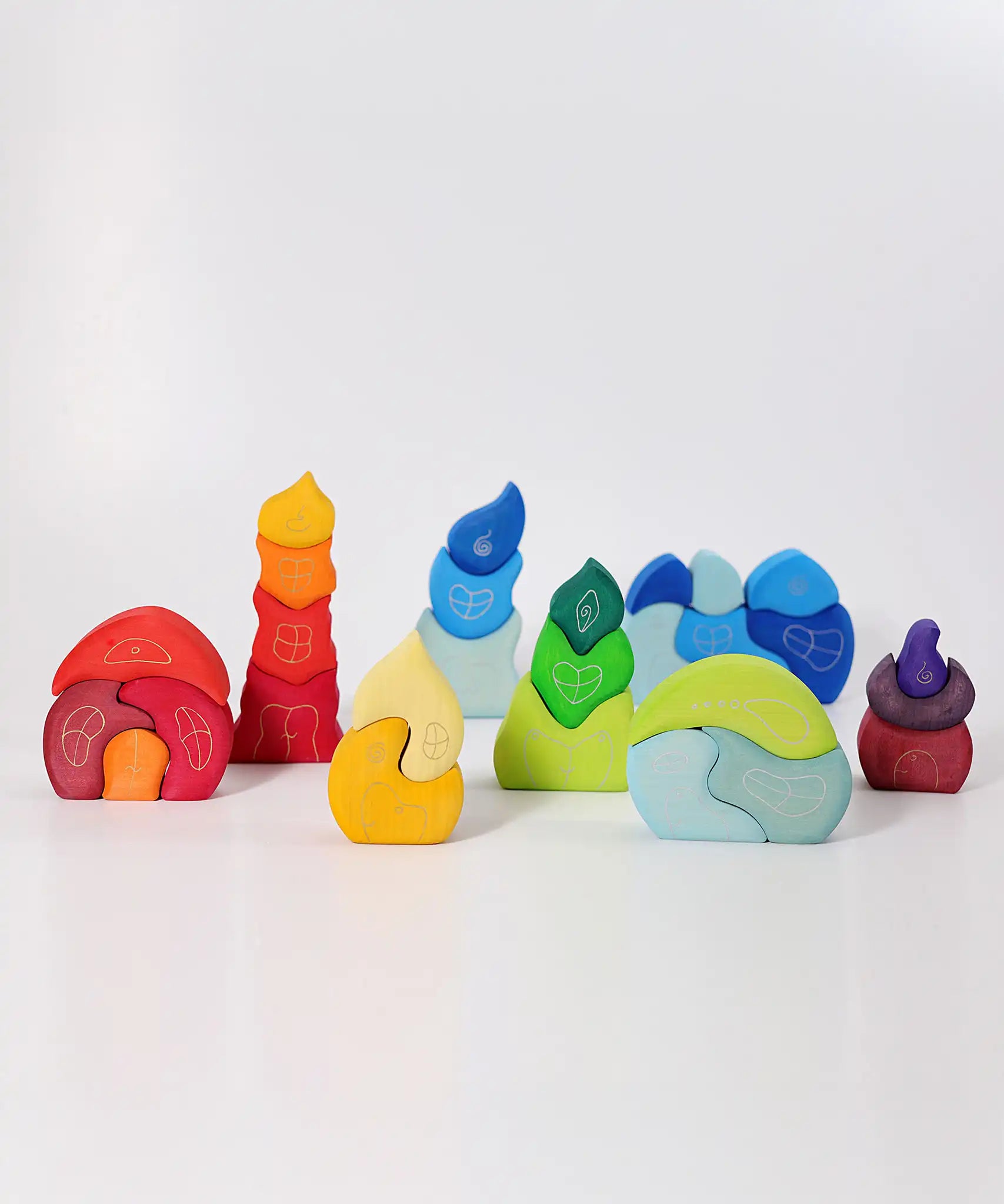 Collection of wooden blocks toy houses from Grimm's. 