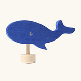 Grimm's handcrafted wooden blue whale decorative figure with a unpainted stand and painted eyes