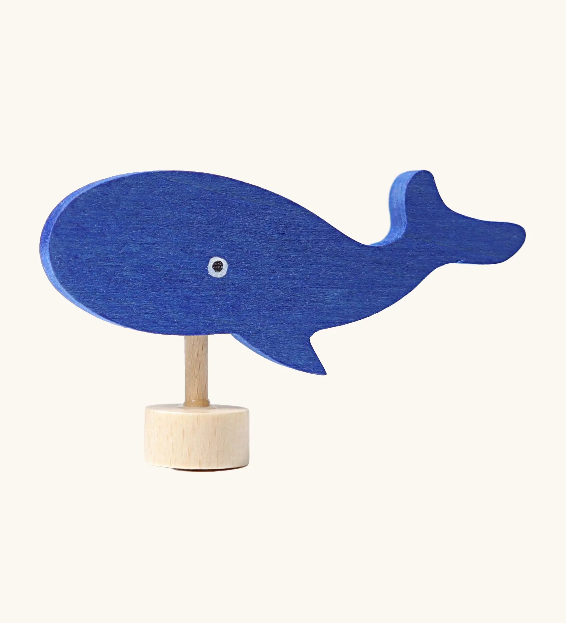 Grimm's handcrafted wooden blue whale decorative figure with a unpainted stand and painted eyes