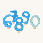 Grimms wooden decorative number figures 0-9 in blue. Features a small wooden base stand to slot in the celebration ring