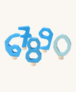 Grimms wooden decorative number figures 0-9 in blue. Features a small wooden base stand to slot in the celebration ring