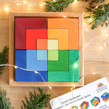 Grimm's puzzle square booklet displayed next to a compatible wooden square creative set 