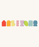 The shaped inserts from the blocks included in the Grimm's window building set.  These Grimm's wooden blocks are part of a wide range of wooden toys available here at Babipur. 