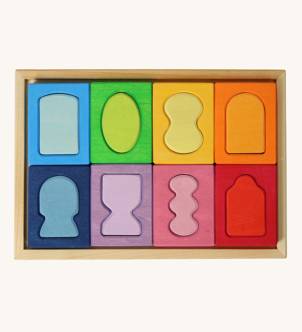 Grimm's Windows Building Set wooden blocks in a wooden storage tray. These Grimm's wooden blocks are part of a wide range of wooden toys available here at Babipur. 