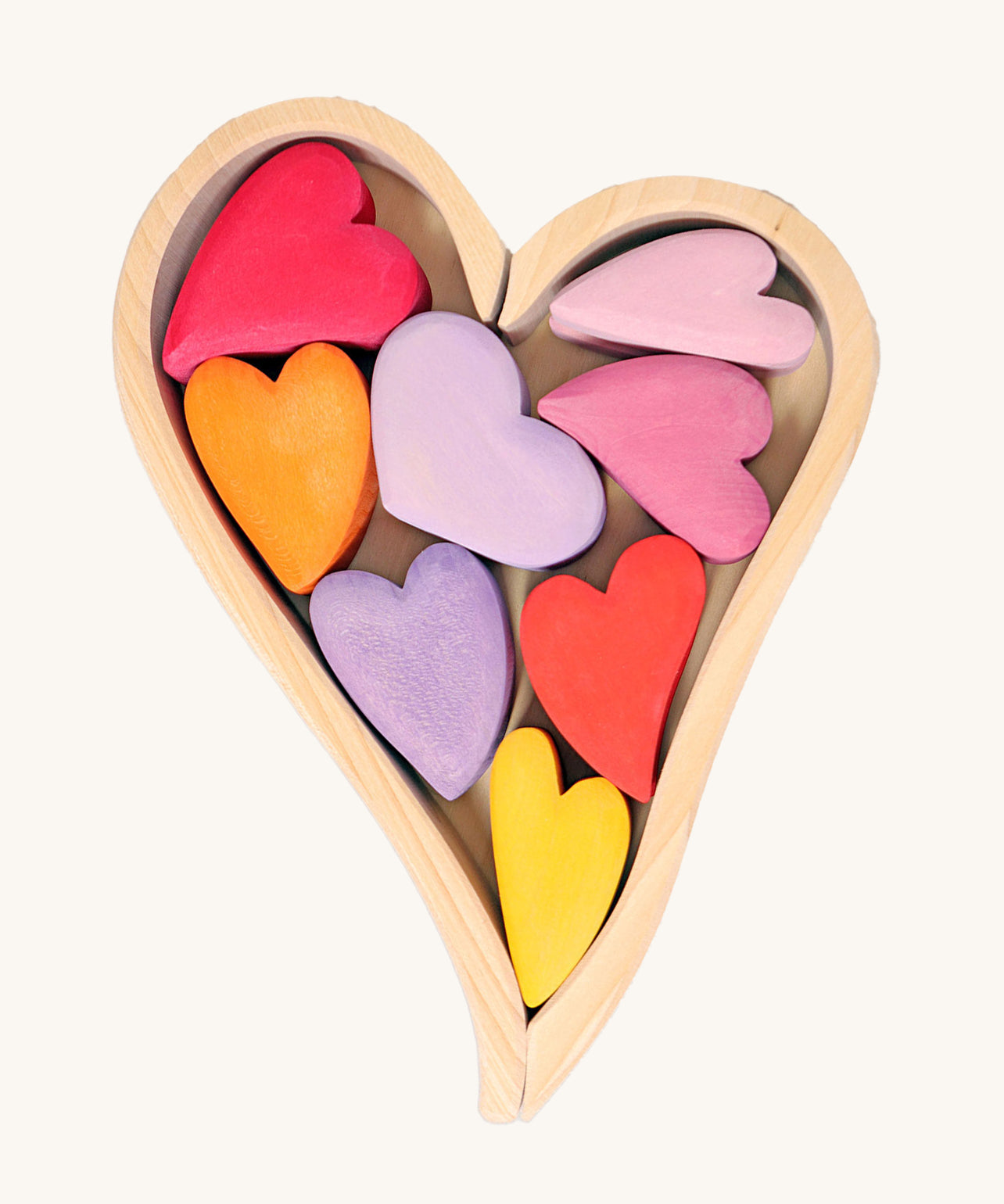 Grimm's Building Set Red Hearts. A wooden heart shaped frame with wooden hearts inside.
