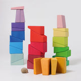 Three stacks created using the blocks from the Grimm's sloping blocks building set.